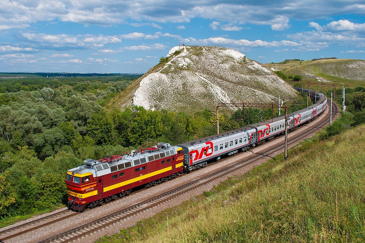 Passenger Train in Rural Landscape