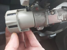 Undoing the grub screws on the VW Transporter ignition switch to release and replace the key mechanism