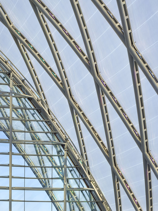 Interior photograph of Anaheim Regional Transportation Intermodal Center atrium, highlighting natural light penetration and spacious passenger areas, Anaheim, California
