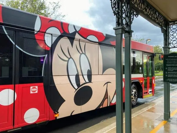 A Disney bus featuring Minnie Mouse wrapping design