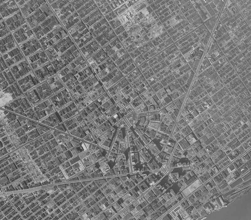Downtown Detroit in 1951, showing a thriving urban center with streetcars.