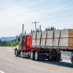 Flatbed trucks are essential for transporting oversized items in logistics
