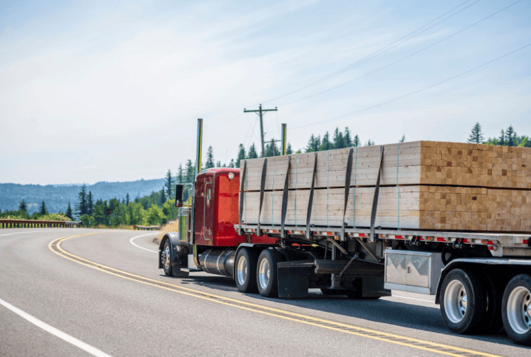 Flatbed trucks are essential for transporting oversized items in logistics
