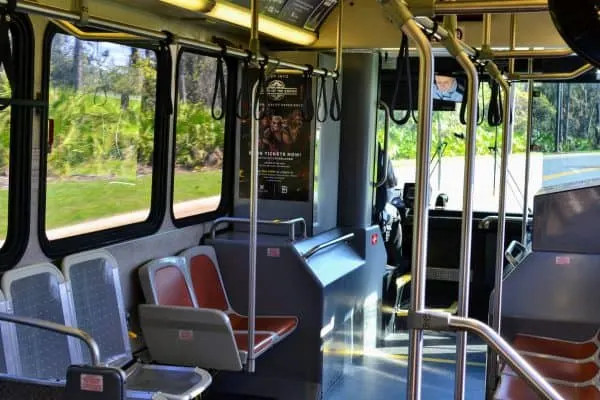 Interior of a Disney bus showing passenger seating