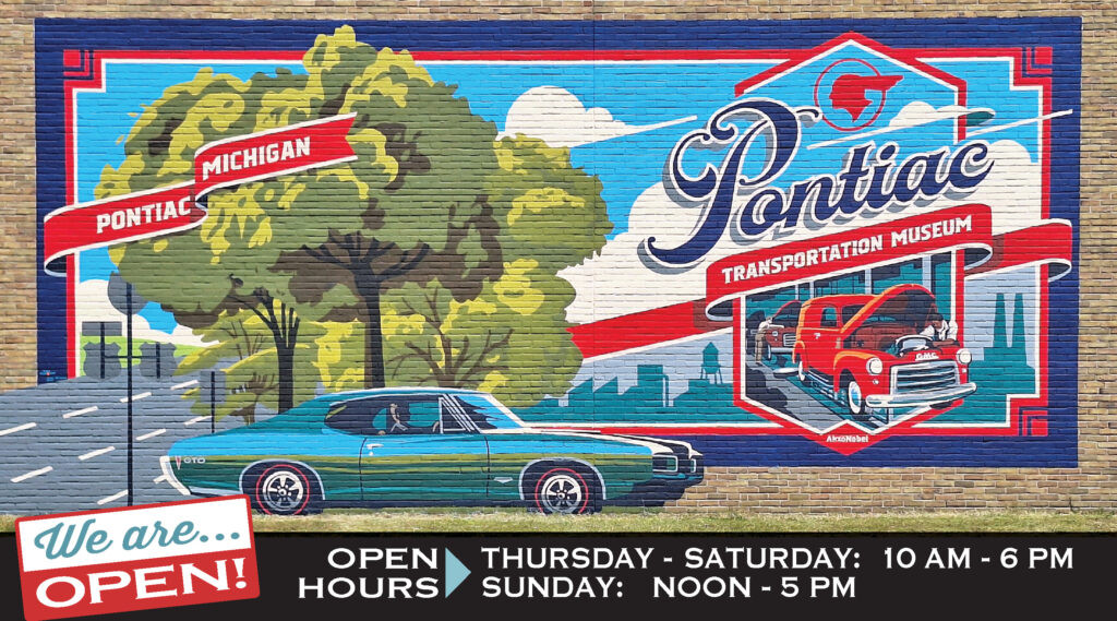 Mural at Pontiac Transportation Museum showcasing hours and automotive theme
