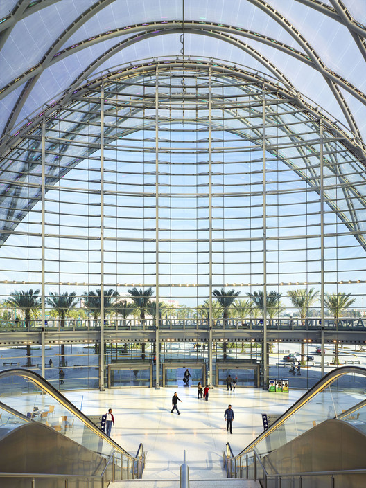 Exterior view of Anaheim Regional Transportation Intermodal Center showcasing its parabolic diagrid structure and surrounding landscape, Anaheim, California