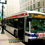 Interior of a SEPTA low-floor articulated bus showcasing wheelchair accessibility features in Philadelphia public transit.