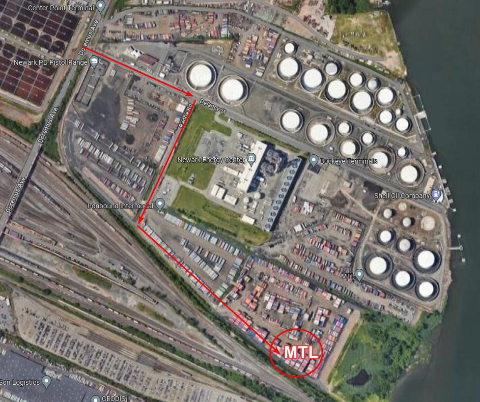 Vehicle delivery waypoint at 921 Delancy St, Newark, NJ, USA, indicating Marine Transport Logistics' efficient delivery network.