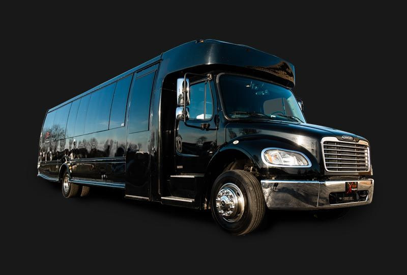 Dynamic 30 passenger party bus with vibrant lighting, designed for larger celebratory groups