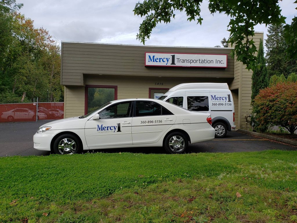 Interior view of a modern, spacious medical transportation van with comfortable seating