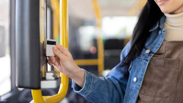 Employee using public transport in Brazil
